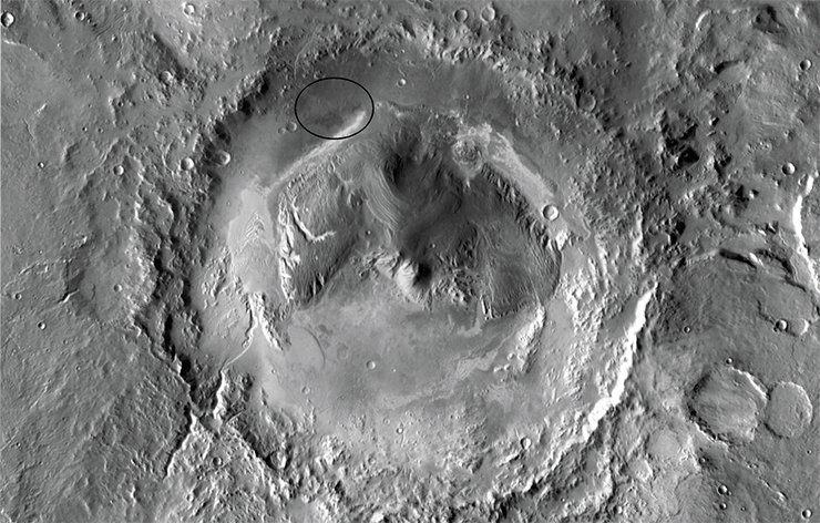 The ancient Martian crater Gale, 154 km in diameter, near the equator in the eastern hemisphere of Mars. Image from Mars Odyssey Orbiter, 2001. Credit: NASA/JPL-Caltech/Arizona State University