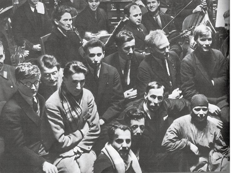 During music recording for the film Alone. In the first row on the left is L. Trauberg; in the second row are D. Shostakovich, G. Kozintsev, and sound engineer I. Volk; in the third row is A. Moskvin 