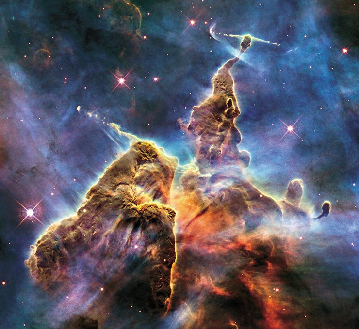 Stars and planets arose from gas-and-dust clouds similar to the cloud with nascent starts in the Carina nebula. NASA, ESA, and M. Livio and the Hubble 20th Anniversary Team (STScI)