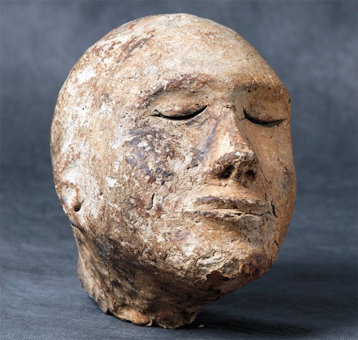 Clay head from the Shestakov tomb. The Kemerovo Oblast. Excavated by A. I. Matrynov. Photo by M. Vlasenko