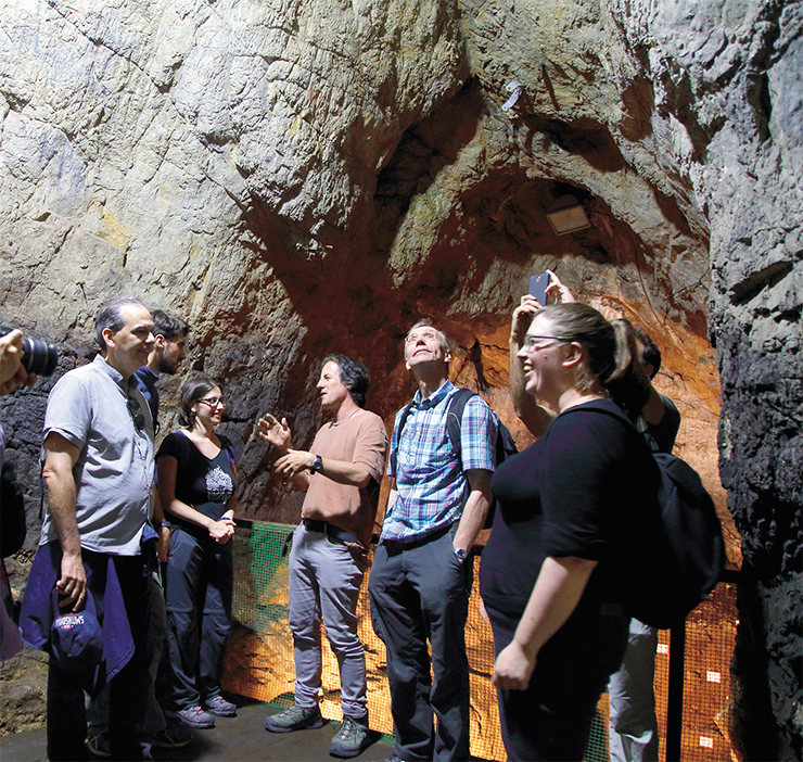 Participants of the international symposium “The origin of the Upper Paleolithic in Eurasia and evolution of the genus Homo” on an excursion in Denisova cave. Gorny Altai, July 2018