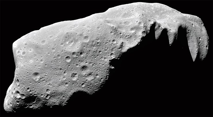 Similar to all other asteroids, this asteroid, 243 Ida, 58 km in length, maintains on its surface the traces of all the processes that took place in the solar system, first and foremost, impact events. Image from NASA’s Galileo spacecraft, 1993. Credit: NASA/JPL-Caltech