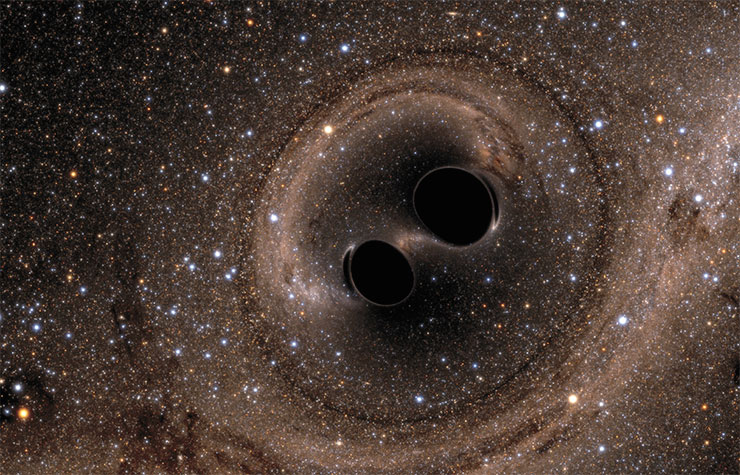 Two black holes merge into one. © Simulating eXtreme Spacetimes (SXS) project