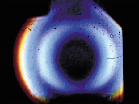 This light from the first superconducting wiggler developed by BINP SB RAS demonstrates the radial distribution of synchrotron radiation intensity. The photograph was taken by the author