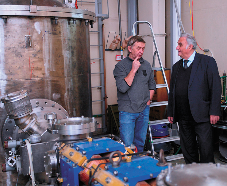 Standing near the Tandem BNCT accelerator are Sergei Taskaev (INP SB RAS, Novosibirsk), one of its creators, and Vladimir Bregadze (NIOEC RAS, Moscow), the developer of boron-containing anticancer compounds
