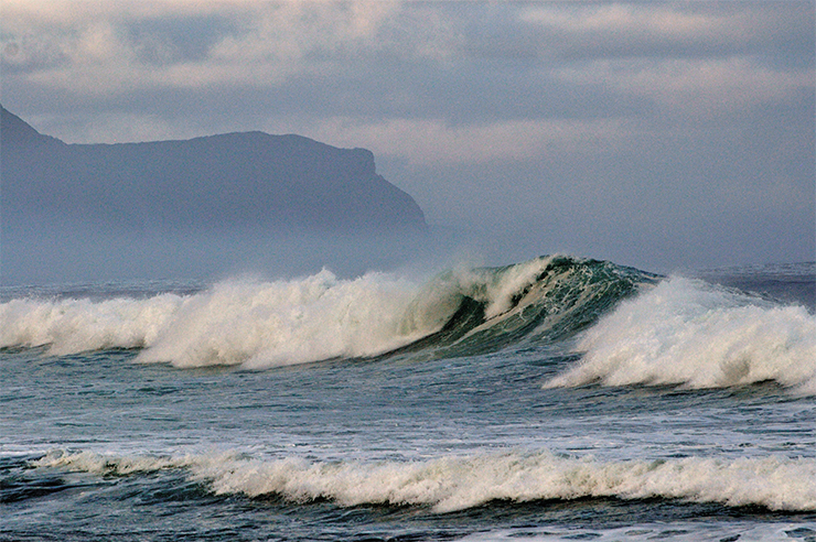 It is only the rocky capes on the Pacific coast that can shelter the expedition camp from the raging ocean