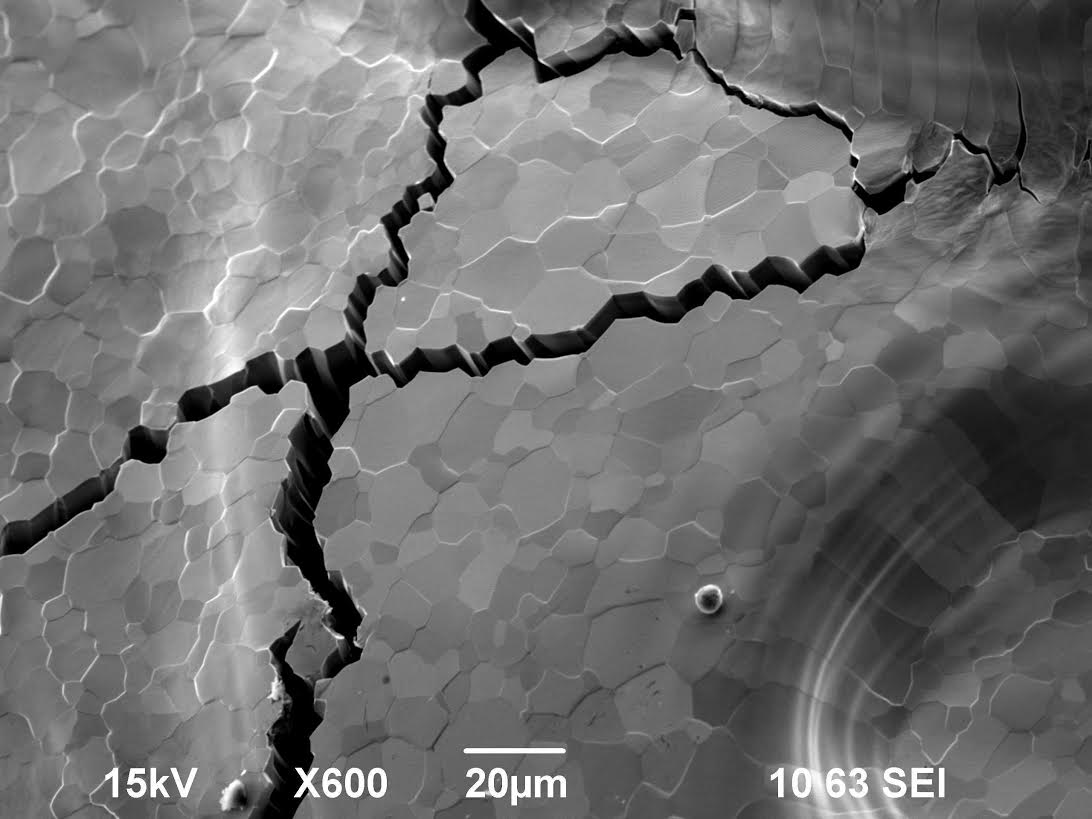 A crack on a melted tungsten surface after exposure to irradiation from the GOL-3 facility. The image was taken with a scanning electron microscope. Photo courtesy of the BINP press service 