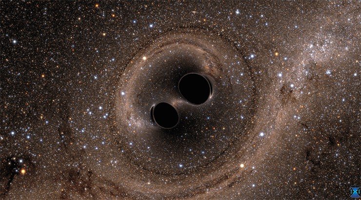 Две черные дыры сливаются в единое целое. Image Credit: the Simulating eXtreme Spacetimes (SXS) project (http://www.black-holes.org)