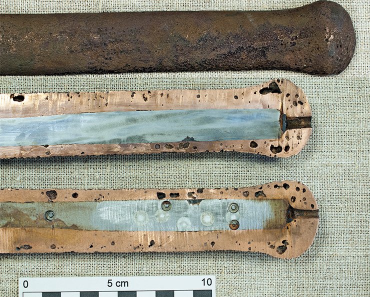 The metal rod from the Xiongnu Tumulus 22, Noin-Ula, has a steel core and a copper shell. As the multifaceted study has shown, copper was applied by pouring copper melt into a mold cavity, with the internal steel rod fixed at the edges between two cast iron plates, as evidenced by the holes on the rounded edges of the rods