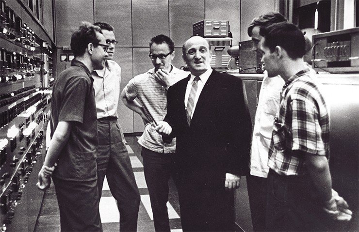In the VEPP-2 control room. From left to right: V. A. Sidorov, I. Ya. Protopopov, S. G. Popov, G. I. Budker, A. N. Skrinsky, and V. V. Petrov. 1964. Photo by R. Akhmerov
