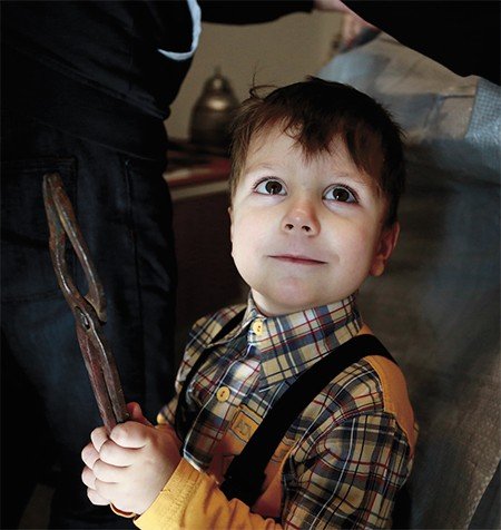Klim, the son of Yuri Filippovich, knows the ancient armor technology since childhood. Photo by V. Klamm