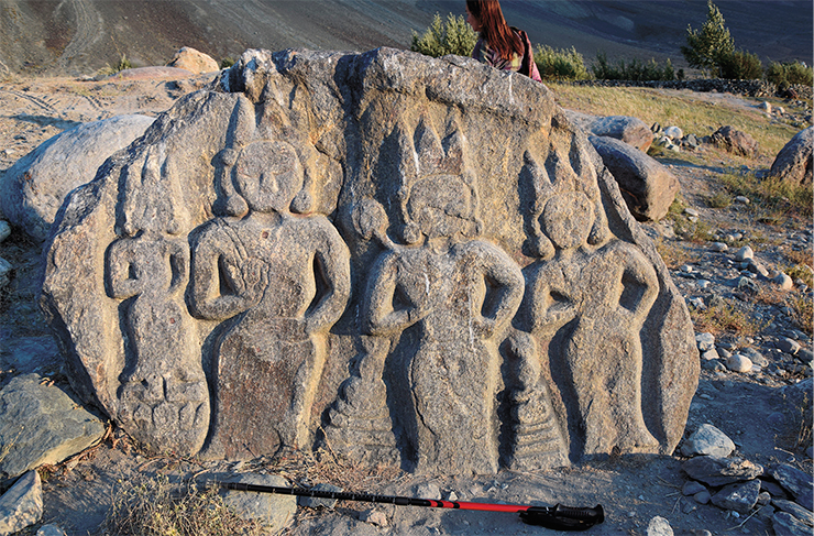 Stone slab with images of Buddha, bodhisattvas, and stupas. Zanskar