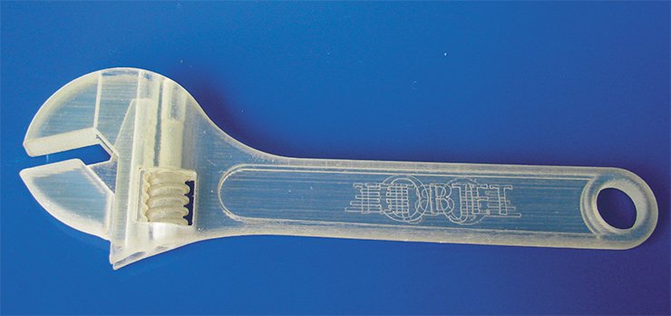 Additive manufacturing allows not only manufacturing of the components with complex shapes but also with integrated movable parts – all in one process. One of the examples – a functioning adjustable wrench manufactured on the 3-D printer OBJET – is shown below. OBJET is a true jet printer using polymerizing chemicals instead of inks. This machine with the resolution of 600×600×1600 dpi (42×42×16 µm) can manufacture components using hard and soft (rubber-like) transparent or colored polymers. The smallest thickness of the layer in this machine is a few times smaller than the thickness of a human hair, which allows manufacturing the components with very small elements
