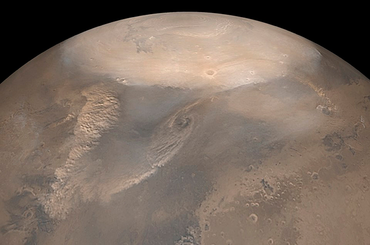 В марсианской полярной шапке различимы два слоя: вокруг внутренней части из вечного льда зимой образуется кольцо из затвердевшей углекислоты