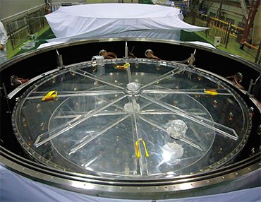 Detector of antineutrinos during assembling – two internal cylinders and photomultiplier tubes along the internal wall of the outer skin are visible. Crerdit: Kam-Biu Luk