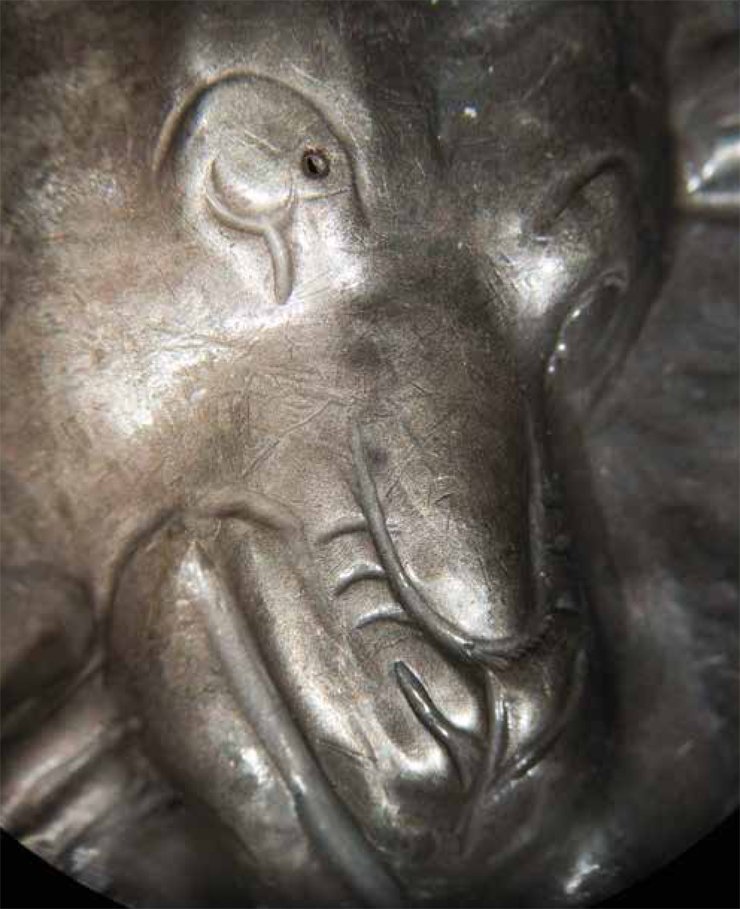 Рис. 4.1. Фрагмент серебряной бляхи с изображением единорога